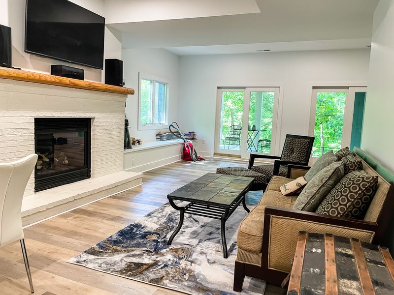 Finished basement with a fireplace, a finished basement by Sidney Design & Build in Winchester, VA