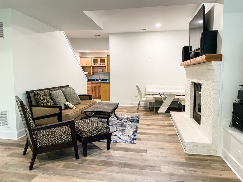 Basement family room, a finished basement by Sidney Design & Build in Winchester, VA