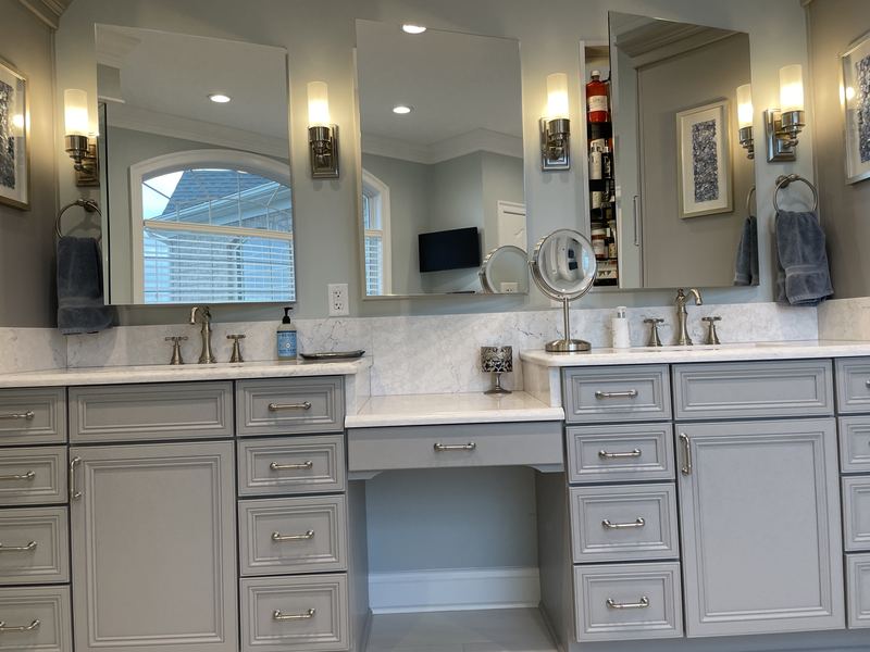 Double vanity with a makeup station, a bathroom remodel by Sidney Design & Build in Winchester, VA