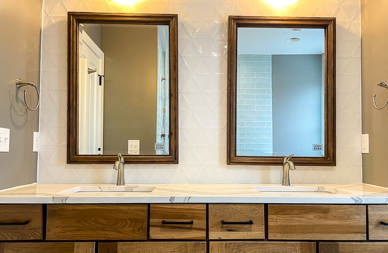 Wood double vanity, a bathroom remodel by Sidney Design & Build in Winchester, VA