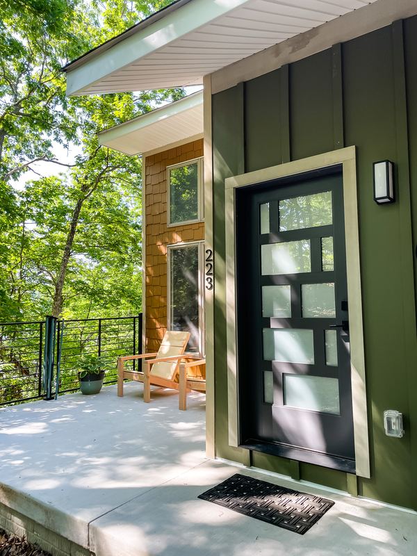 Front entry with a modern door, a custom home by Sidney Design & Build in Winchester, VA