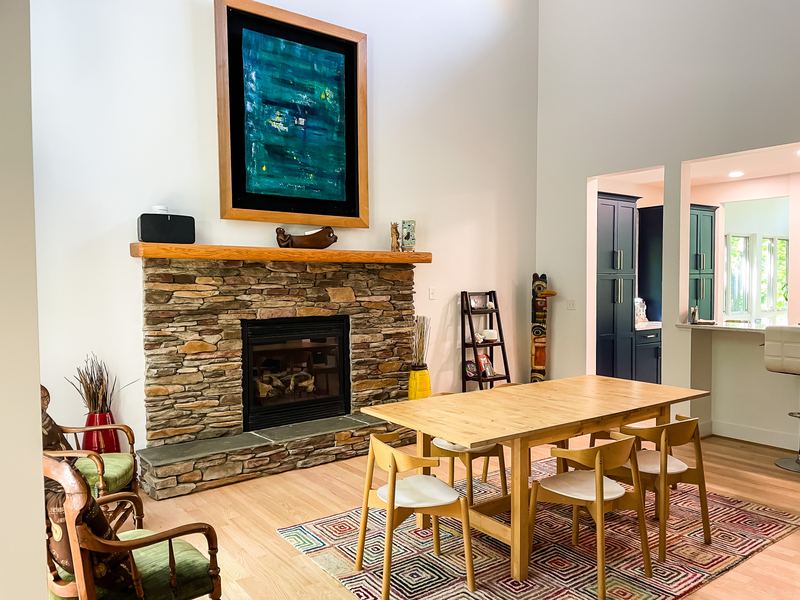 Ledgestone fireplace in an open room, a fireplace renovation by Sidney Design & Build in Winchester, VA