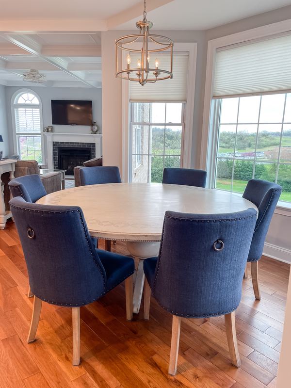 Dining room with a lantern chandelier, a interior renovation by Sidney Design & Build in Winchester, VA