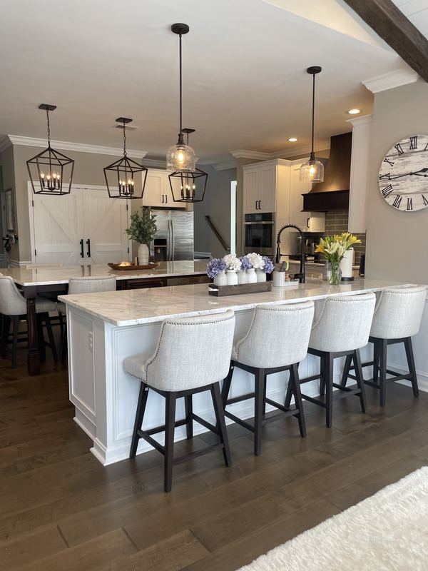 Long island, lantern pendants, seating for four, a kitchen remodel by Sidney Design & Build in Winchester, VA