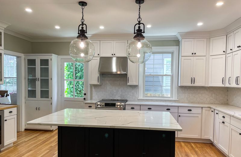 Black island, white perimeter, a kitchen remodel by Sidney Design & Build in Winchester, VA