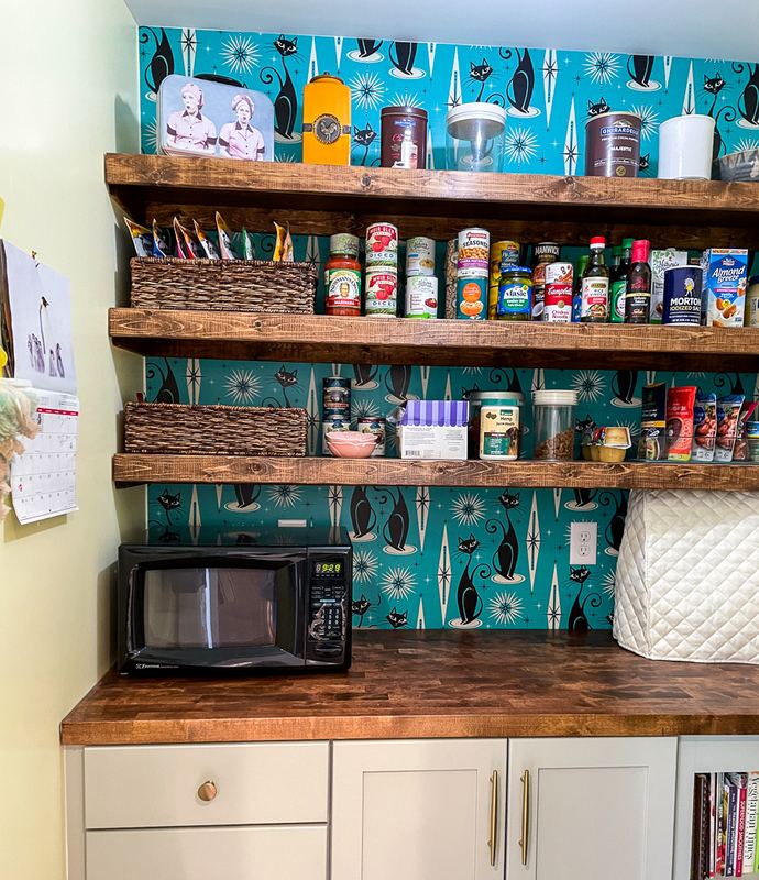 Open shelving over a teal backsplash, a kitchen remodel by Sidney Design & Build in Winchester, VA