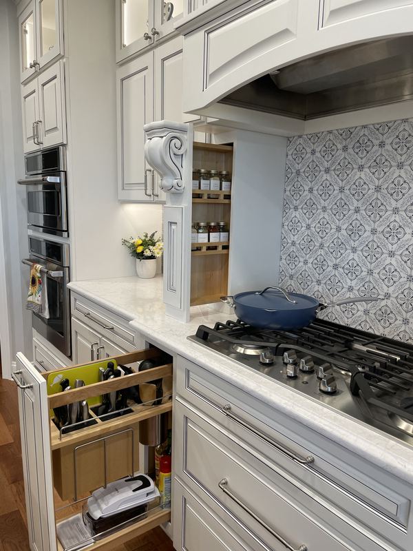Pull out spice storage beside the range, a kitchen remodel by Sidney Design & Build in Winchester, VA