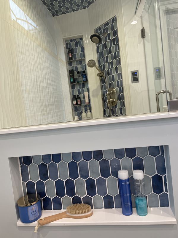 Mosaic tile niche, a walk in shower by Sidney Design & Build in Winchester, VA