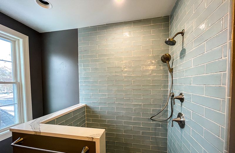 Walk in shower behind a half wall, a walk in shower by Sidney Design & Build in Winchester, VA