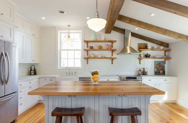 Kitchen remodel exposed beams butcher block island by Sidney Design & Build