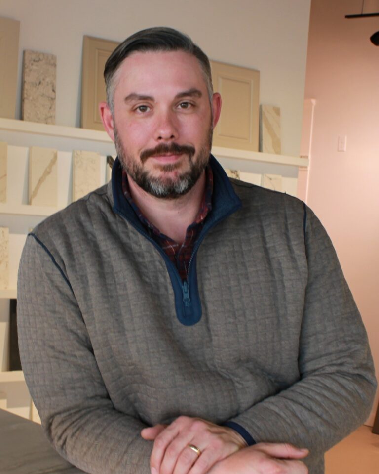 Sidney Design & Build team member in the showroom in Winchester, VA